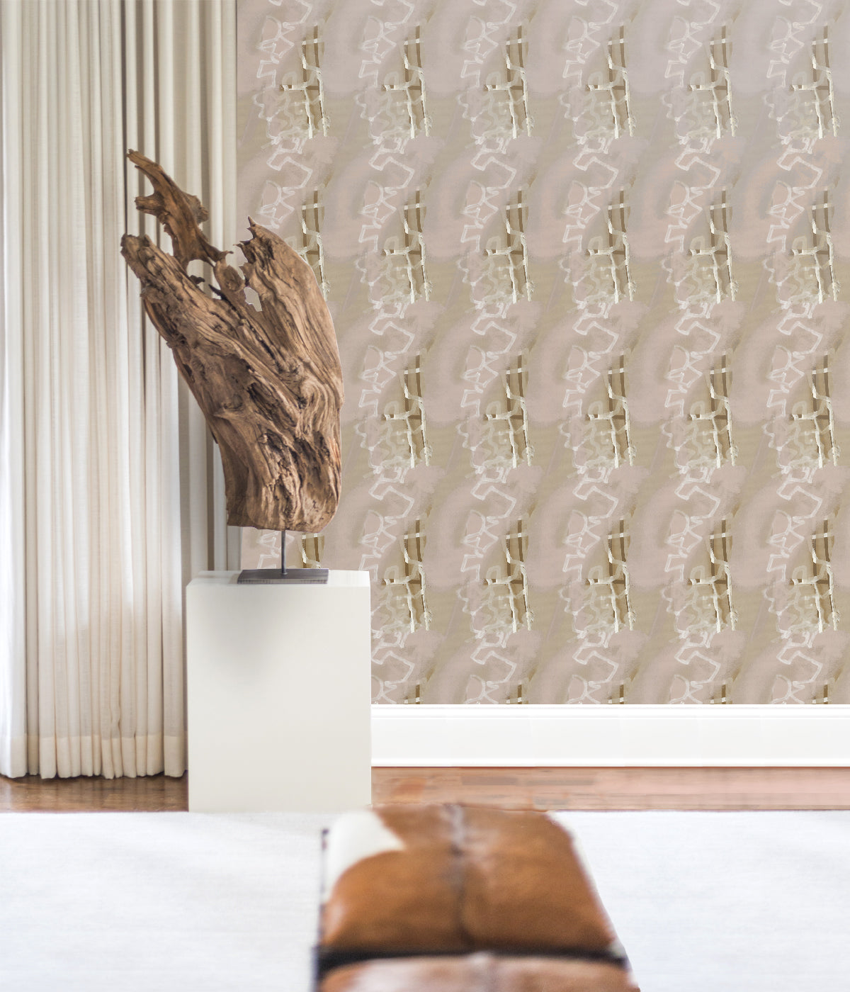Luxury wallpaper by Angela Simeone installed in a designer living room, painterly pattern in warm neutral tones