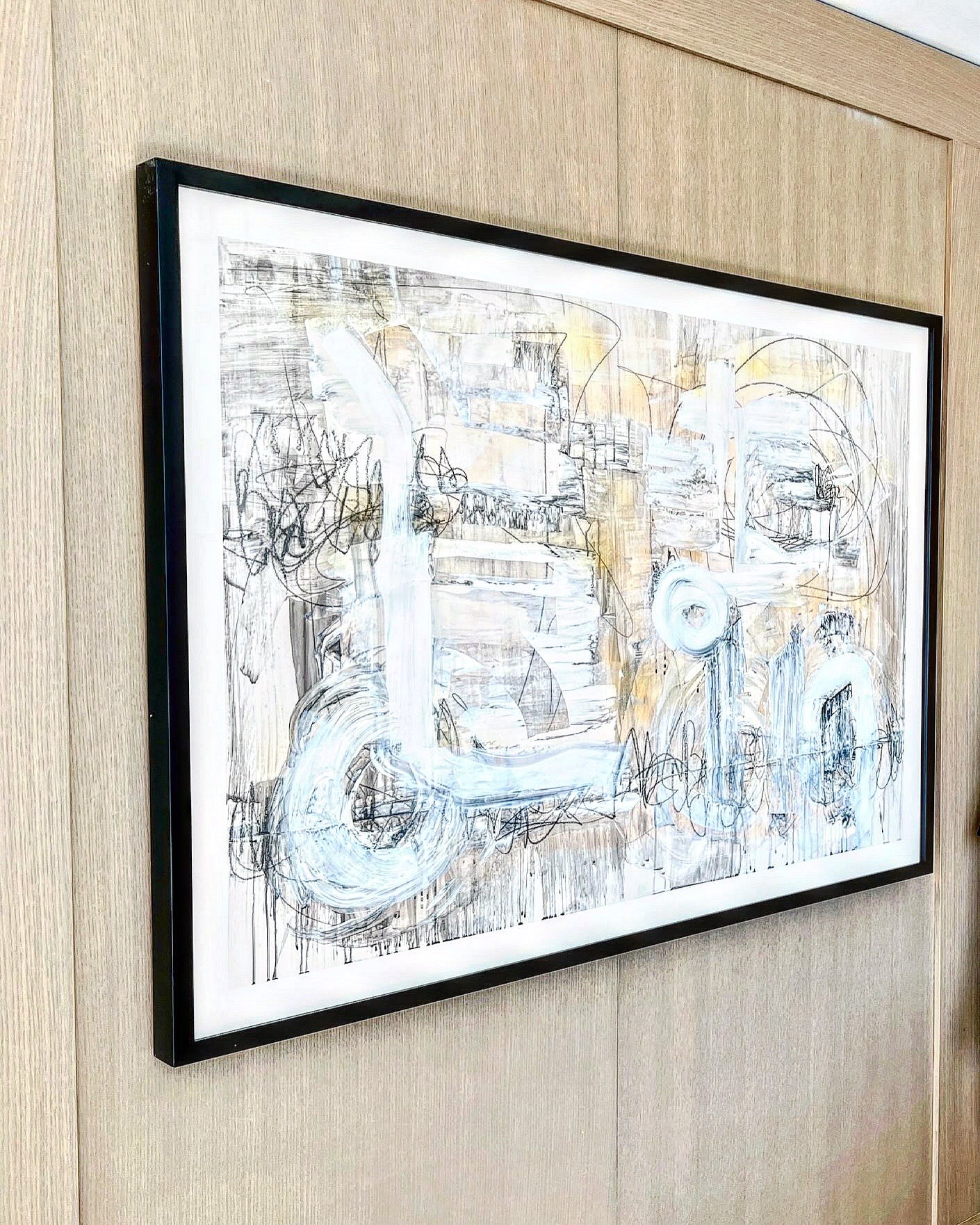 Angela Simeone graphite and white abstract painting installed in a Conrad Nashville private suite