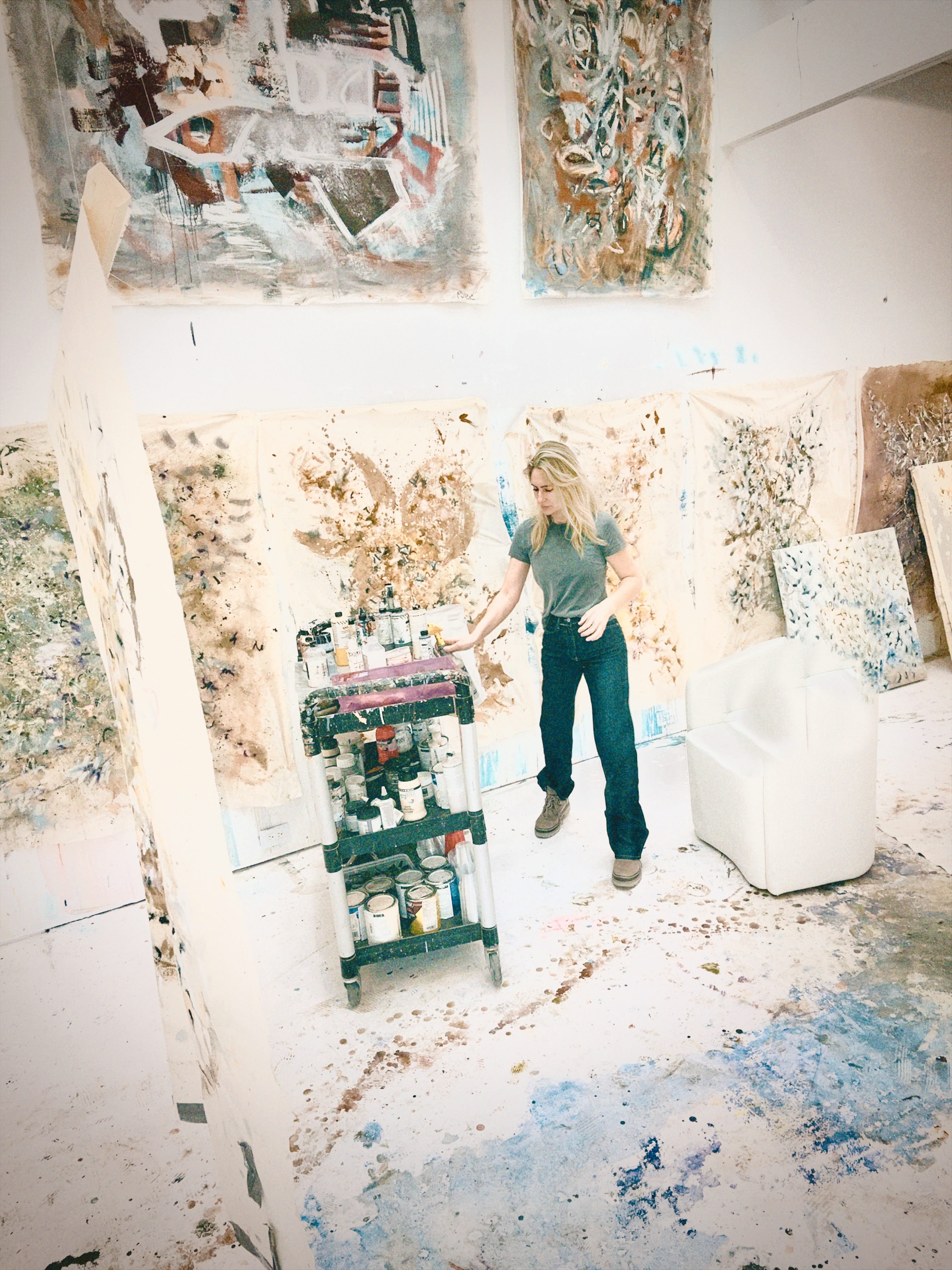 Paint-covered studio work boots belonging to Nashville abstract artist Angela Simeone, evidence of the artist's hand at work