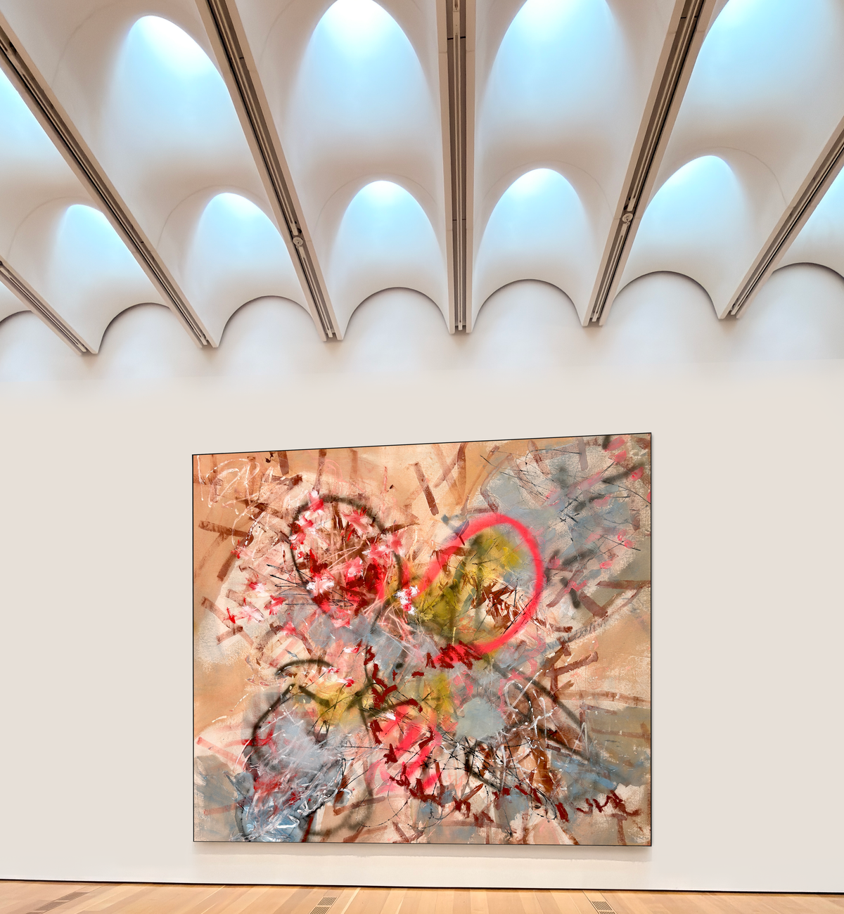 A large abstract painting installed in a bright gallery room with a scalloped ceiling, by Nashville artist Angela Simeone.