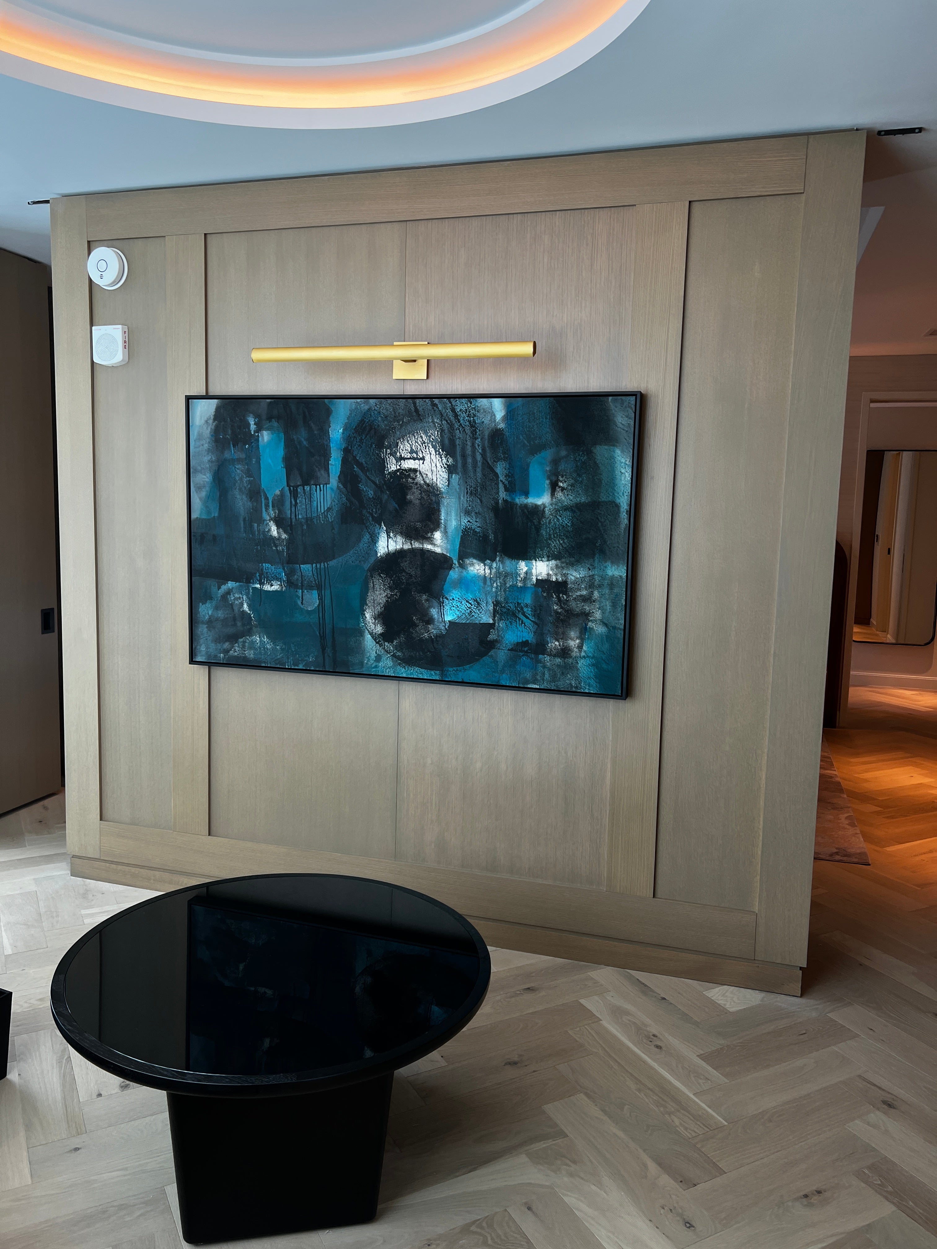 Original abstract painting by Angela Simeone installed in a Conrad Nashville private suite